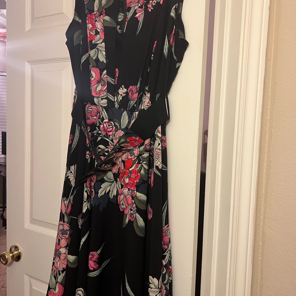 Black floral cocktail dress with attached belt. Size 16